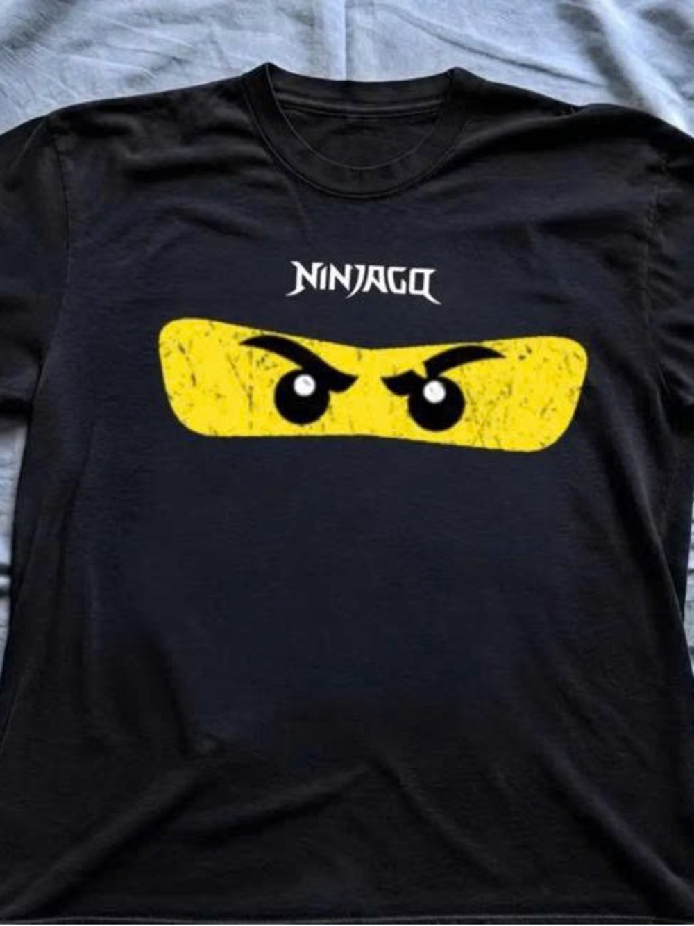 Ninja Black Short Sleeve Tee with Yellow Eye Graphic